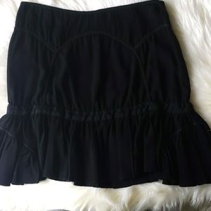 Prada mini black skirt.